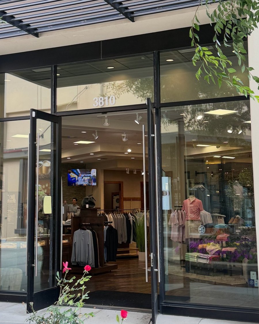 A JDavid's storefront window with clear glass and no display